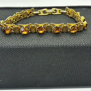 Elegant Gold Bracelet with Amber Stones